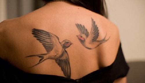тату птицы на спине